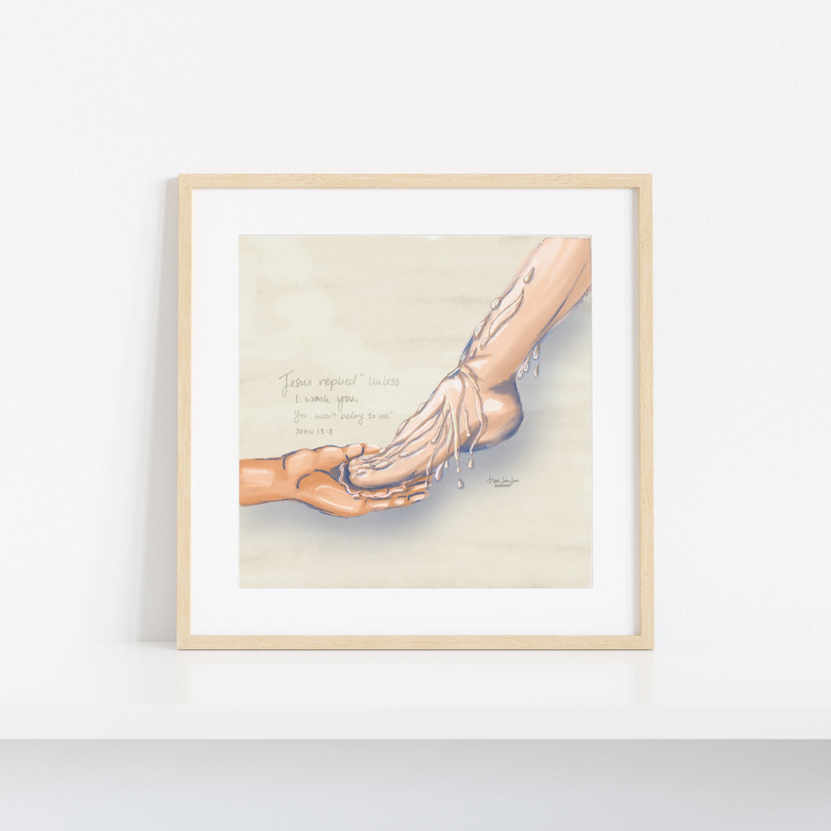 A framed art print featuring a watercolor-style anatomical illustration of a foot and ankle with a hand touching it, displayed on a clean white wall.